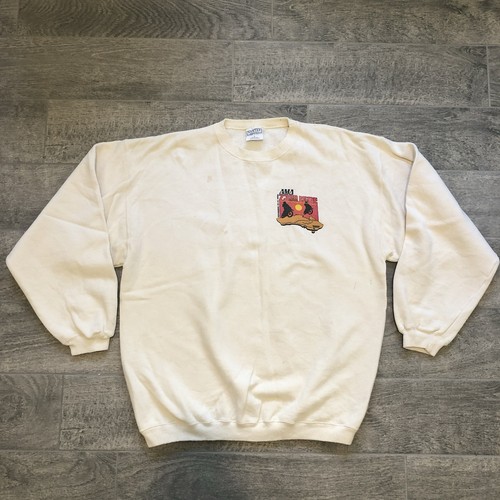 Cream-colored vintage 1998 sweatshirt with black “American Motorbike Assoc” logo and USA map graphic on left chest.