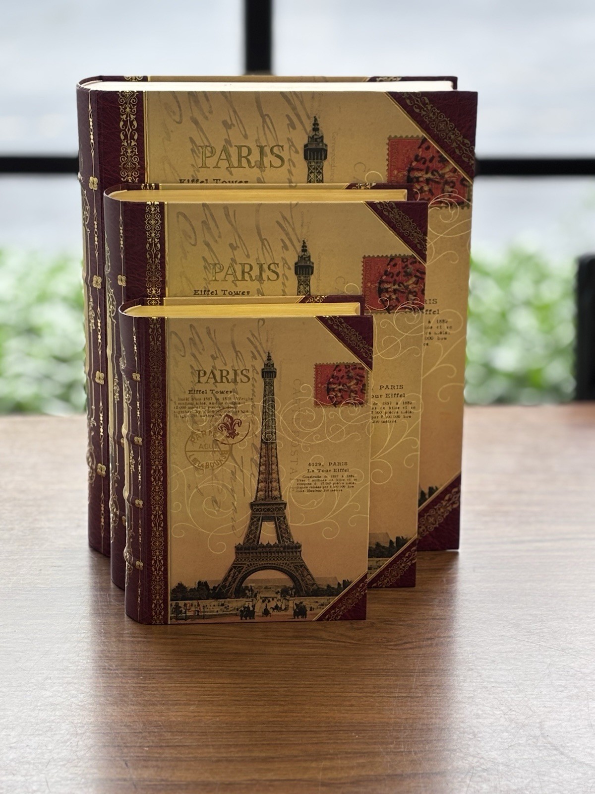 A set of decorative nesting faux storage books by Punch Studio