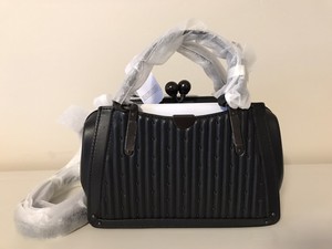 coach kisslock dreamer 21 with quilting and rivets