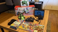 Nintendo Switch Komplettset + 4 Spiele + Mario Kart Live + Controller + …
