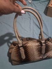 handbags for women used, snake skin. Sling on the shoulder for a chic look