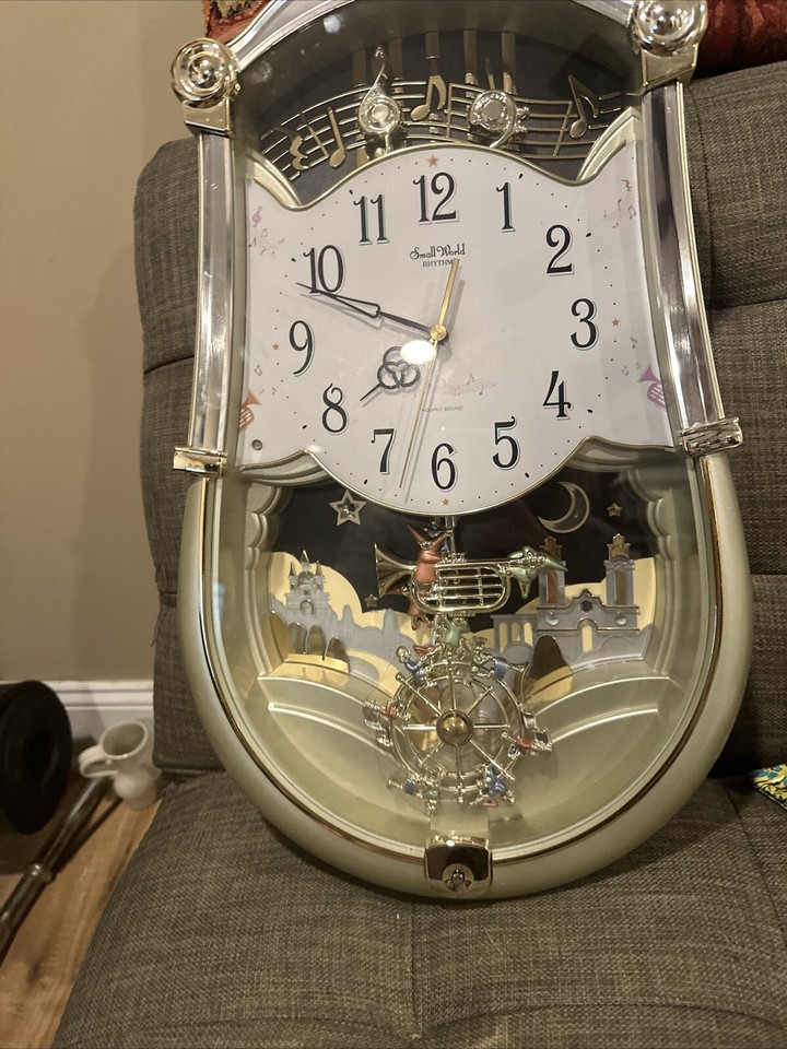 Small World Rhythm Wall Clock 4MH774. Plays Music, lights & Sounds On