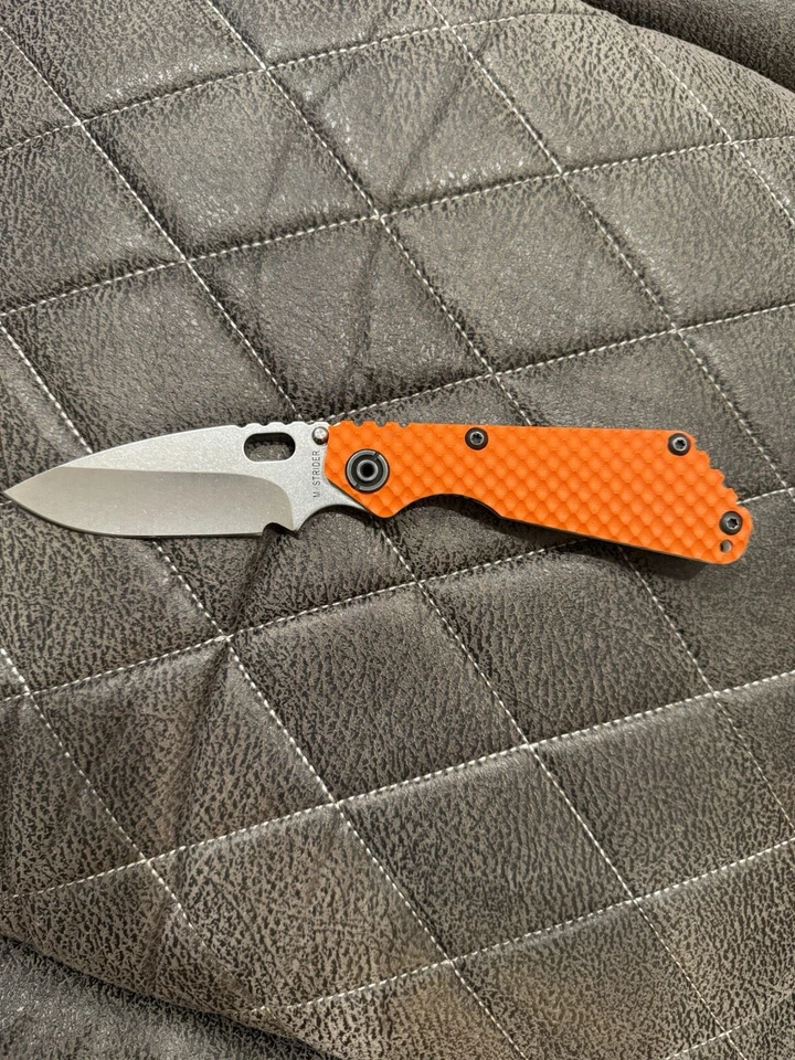 Cerradura de cuadro de titanio Strider SNG DGG naranja G10 EE. UU. Overtravel táctico Foto 2 de 4