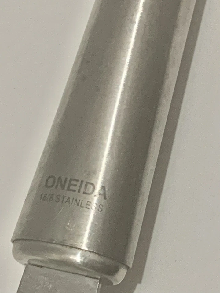 Pelador giratorio de acero inoxidable de la marca Oneida. Vintage Foto 3 de 4