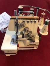 Baby Lock 5180 Serger Sewing Machine With Power Cord And Foot Pedal.