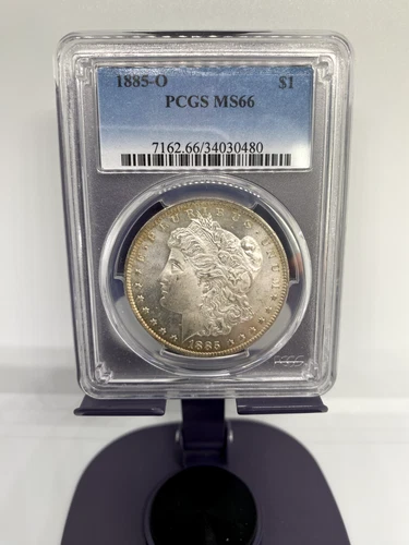 1885 O MORGAN SILVER DOLLAR, PCGS MS66. VERY CLEAN COIN FOR A 66, under graded