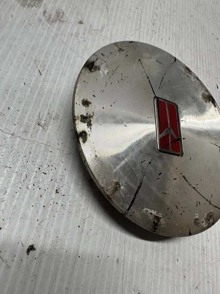 Tapacubos centrales Oldsmobile Delta 88 Ninety Eight Bravada 93-97 OEM 25606966 Foto 2 de 4