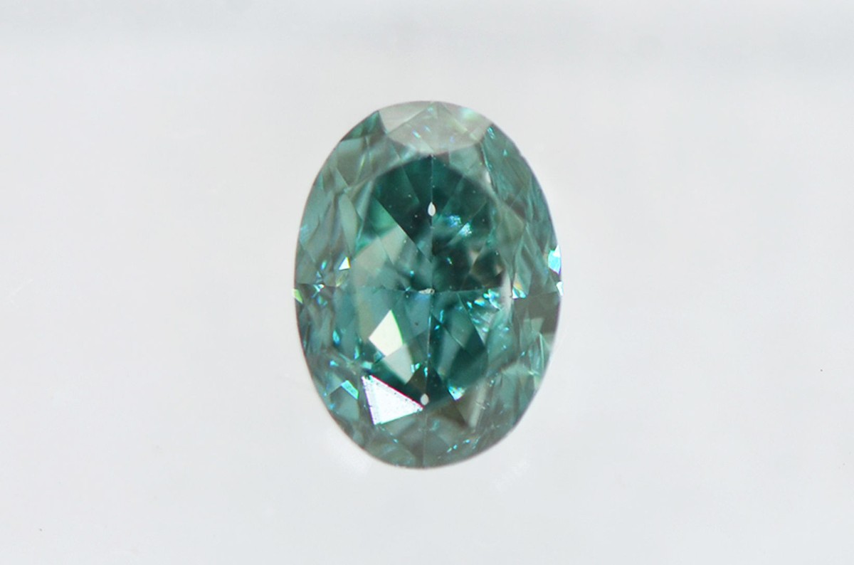 Oval Cut Diamond Fancy Greenish Blue Color Enhanced 0.52 Carat SI2 