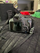 Canon EOS Rebel T6 with bag, charger, filters and extra zoom lens