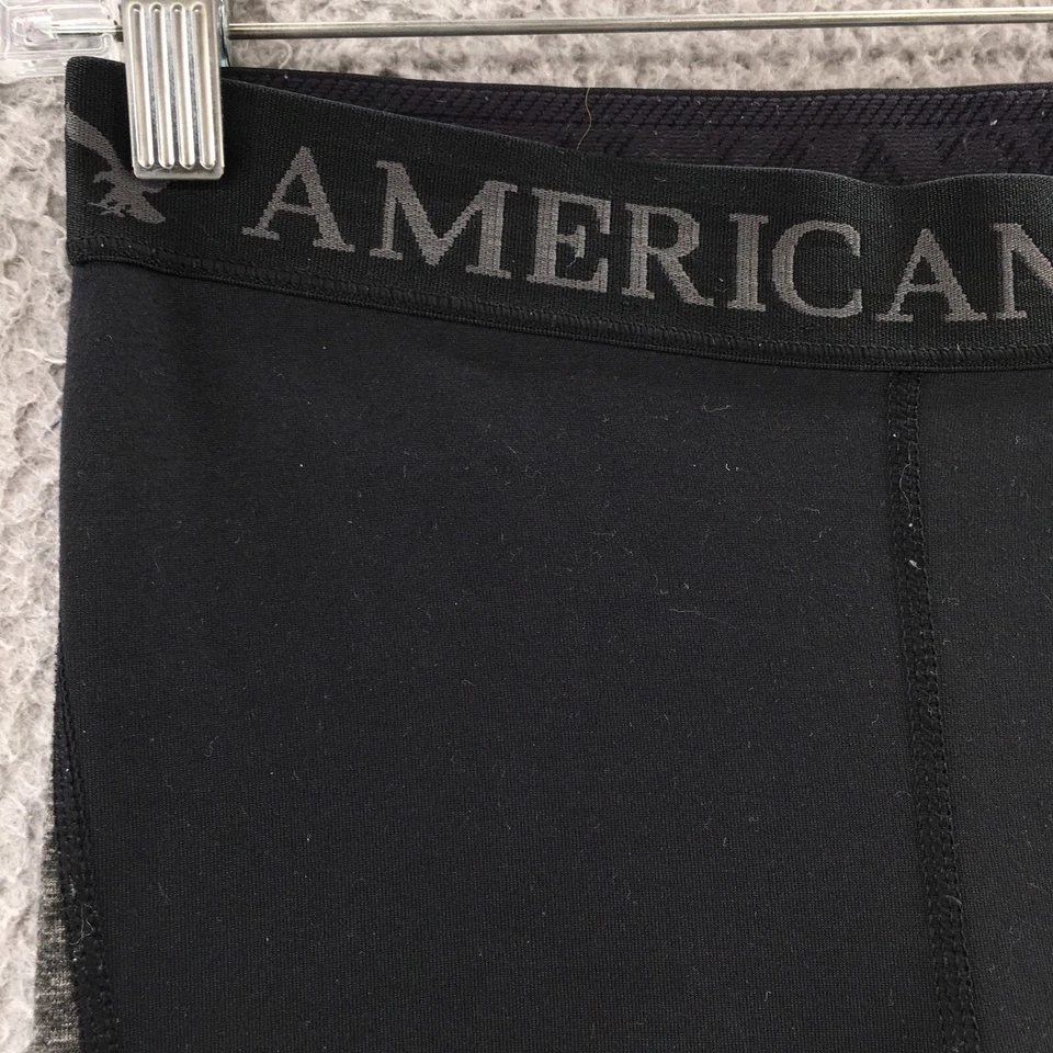 Leggings de tiro alto American Eagle Outfitters para mujer pequeños negros cintura elástica Foto 2 de 4