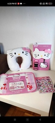  Hello Kitty travel set ,neck pillow  ,bags and eye mask , luggage tag and strap