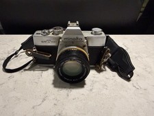 Vintage Minolta SRT 100 35mm Film Camera Minolta Lense 50mm 1: 1.9 WIDE ANGLE