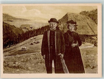 39746857 - An older couple in costume in front of a Black Forest house Celi