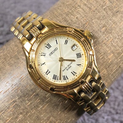 Vintage Seiko Women V782-0779 Dress Date Gold Tone Quartz 26mm