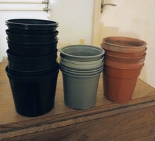 25 Used Medium Size Round Plastic Plant Pots Various Colours Types And Makes