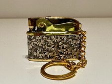 VINTAGE JAPAN GOLD AND SILVER TONE CIGARETTES PETROL LIGHTER "PENGUIN" KEY CHAIN