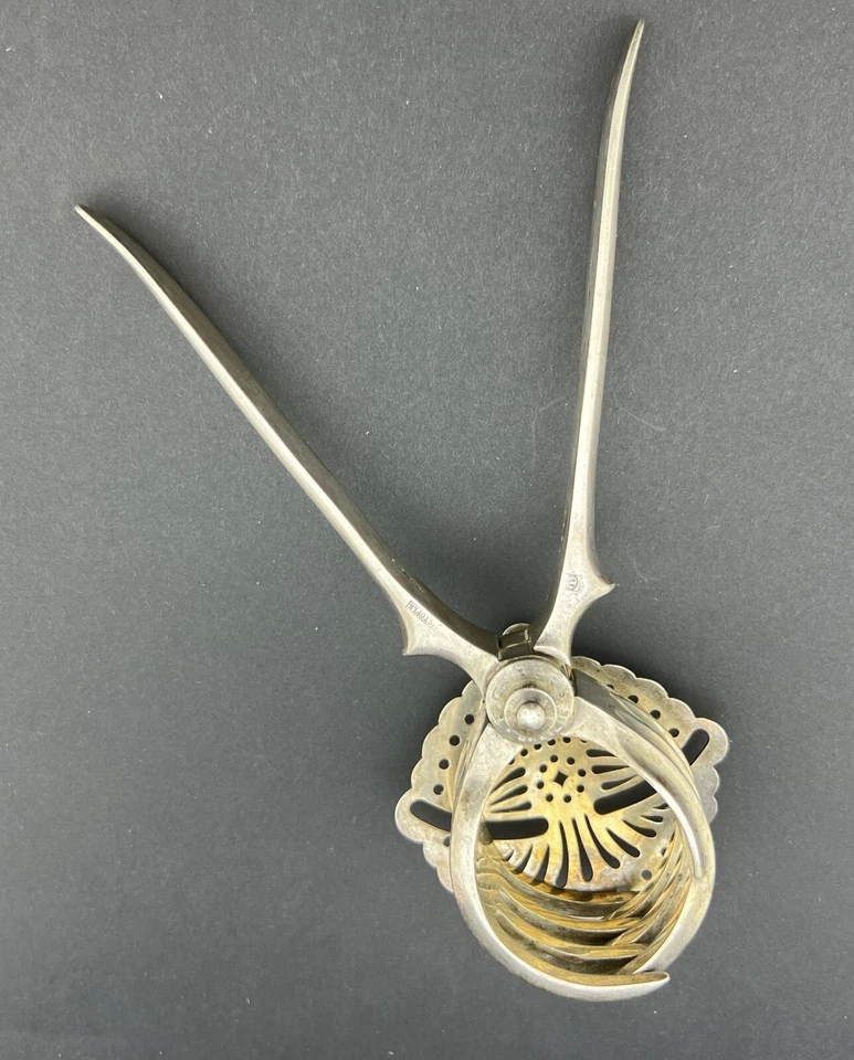 Prensa manual o exprimidor de limón Christofle antigua plateada para cítricos, años 20 Foto 3 de 4