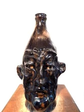 tim whitten face jug , pottery, folk art 10'' x7 ''