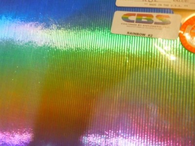 Dichroic Glass:CBS 90 COE Rainbow on Thin Reed Textured Thin Black 3''Sq