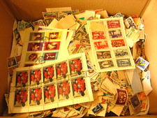 Francobolli mondiali. Africa, Asia, Colonie, Sud america. Usati e nuovi. 710 gr.