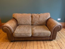 Two seater brown leather and velvet sofa second hand