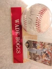 Wade Boggs signed baseball with card and display case