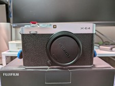 Beautiful FUJIFILM X-E4 body silver with accessories