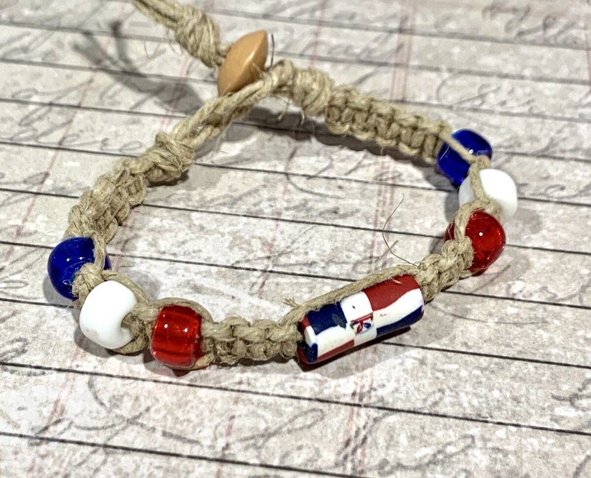Patriotic USA Genuine Glass Jewelry Bracelet featuring red, white and blue  glass beads with the American flag decoration.