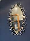 Vintage Retro 1970s white scrolled metal flower design framed Oval wall mirror