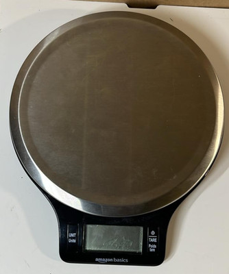 Amazon Basics Digitale Küchenwaage mit LCD Display Schwarz und Edelstahl.