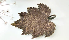 Antique Kashmiri brass sweetmeat dish in the shape of a Chinar leaf, scroll hand