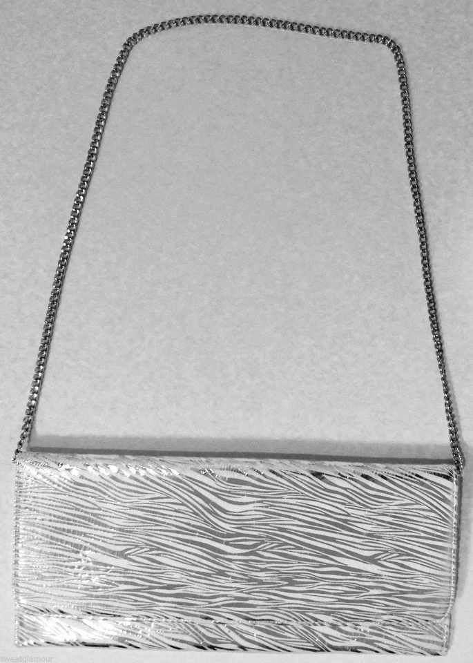 Cartera sin asas Carlos Falchi con estampado de cebra y blanco plateado con solapa 741-783