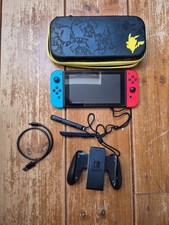 Nintendo Switch With Grip, Charger Cable And Pokemon Carry Case