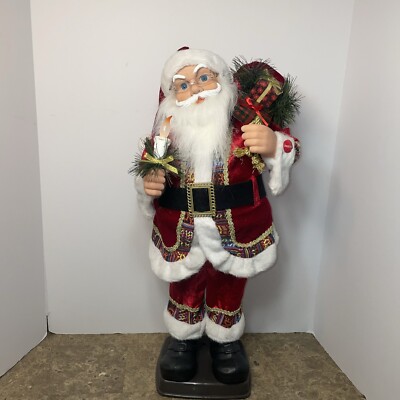 Pan Asian Creations. Animated Santa Claus With Candle And