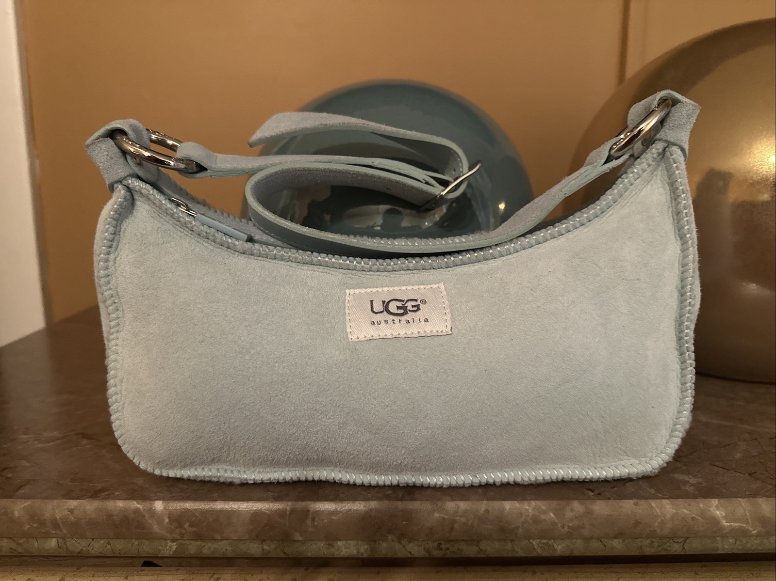 light blue UGG suede shoulder bag