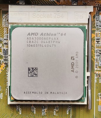 Lot Carte Mère Asus K8V SE DELUXE + AMD Sempron 64 + 1 Go RAM + Ventirad