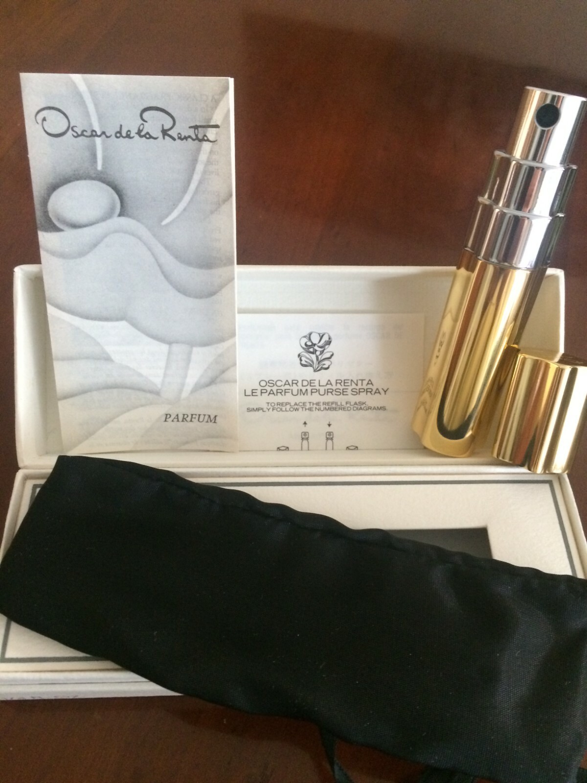 Extrait de parfum Oscar de la Renta 7ml avec vaporisateur de sac rechargeable