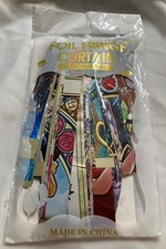 FOIL FRINGE CCURTAIN MULTI COLORED WILD PRINT DESIGN