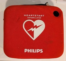 Phillips HeartStart HS1 Defibrillator, Case, 1 battery, 2 pads.