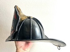 Antique Cairns leather firefighters helmet. 
