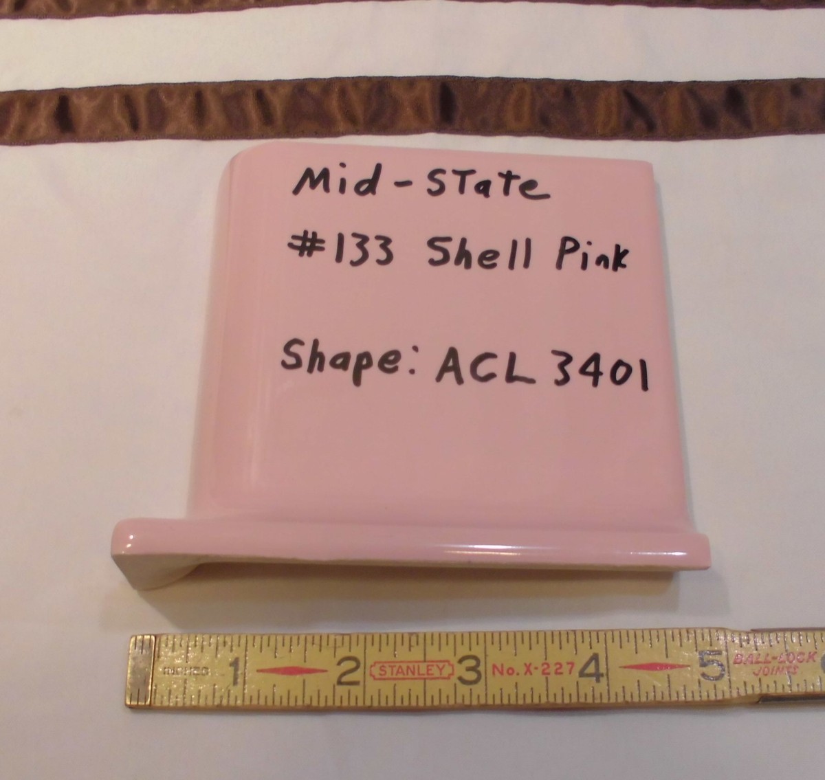 1 pc. Glossy *Shell Pink* 4” X 4” Ceramic Cove Base Outside Corner 