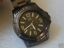 Nice Q Q by Citizen Gun Metal Men's Dress Watch w/White Numbers