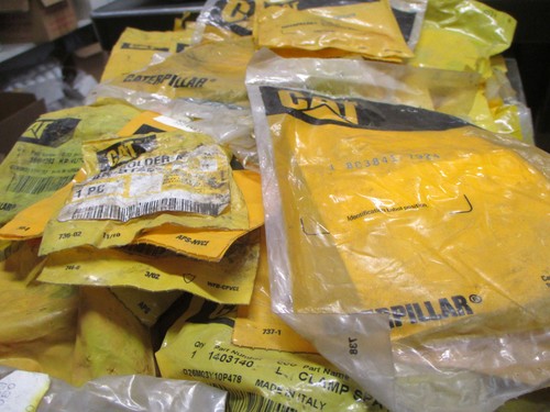 Caterpillar Parts Lot 100 + Small Parts