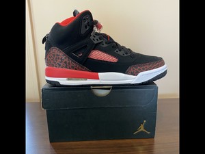 red and black jordan spizike