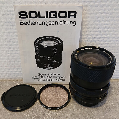 SOLIGIOR Zoom & Macro Objektiv  SM Compact 1:3,9-4,8/28-70mm  + ROWI SKYLIGHT 1A