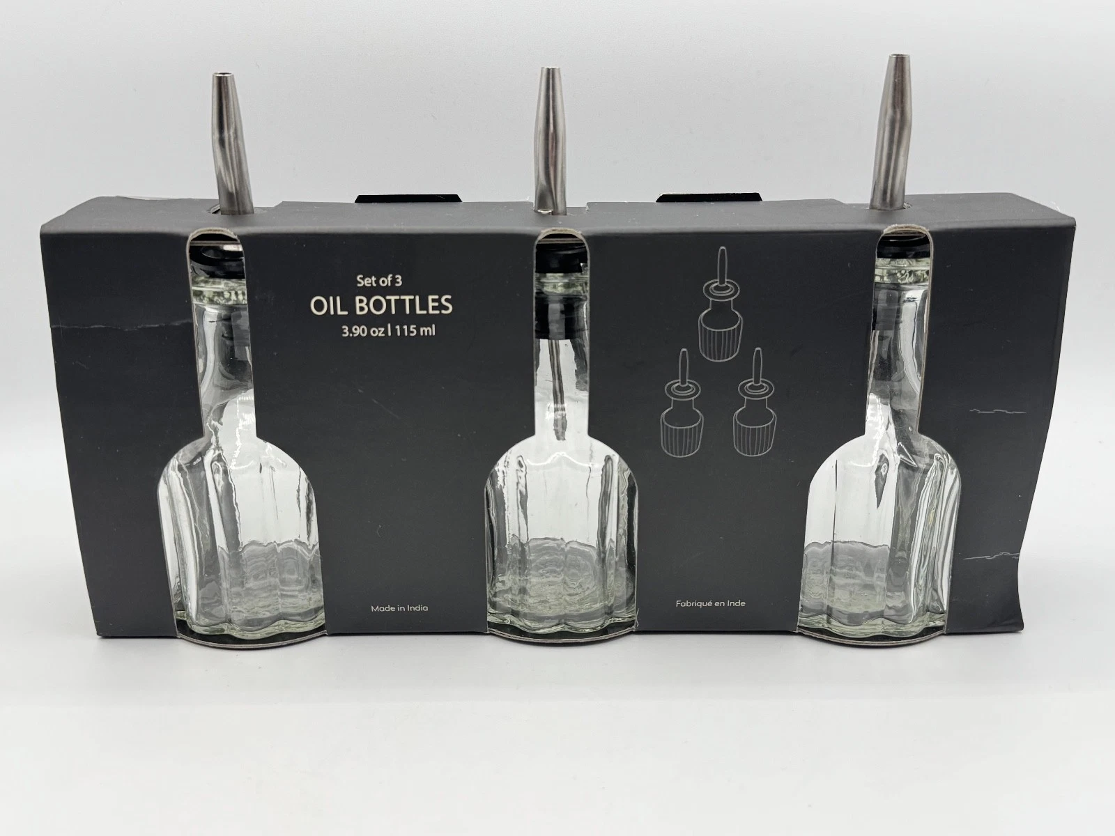 Crown Overseas set of three glass oil and vinegar cruets, 3.38 oz each, w/spouts