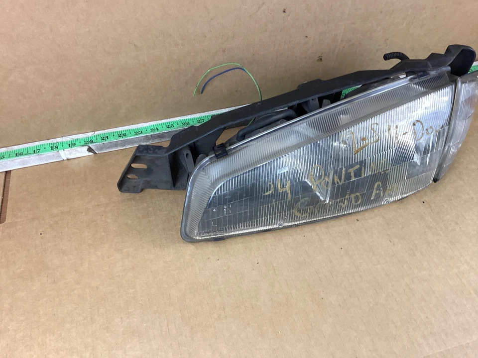 Faro delantero izquierdo del conductor Pontiac Grand Am 1992-1995 16514129 OEM Foto 2 de 4
