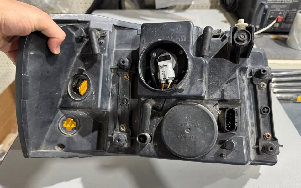 Faro delantero izquierdo GMC ENVOY 2002-2009 P/N 40310748 ORIGINAL OEM PIEZA USADA Foto 4 de 4