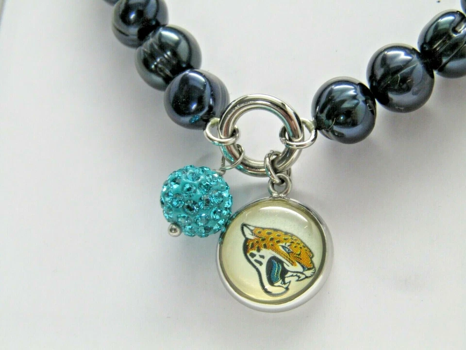 Pulsera Honora Perla Cultivada 7.0mm Equipo NFL Dije Elástico Jaguares Promedio Foto 2 de 4