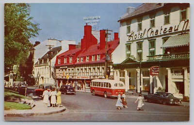 Place d'Armes Rue Ste-Anne Hotel in Quebec Canada c1950s Bus and Autos Postcard